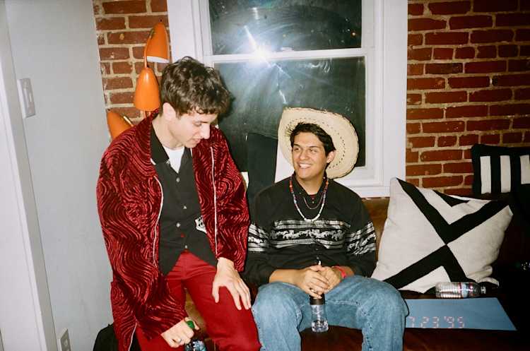 Omar Apollo on couch