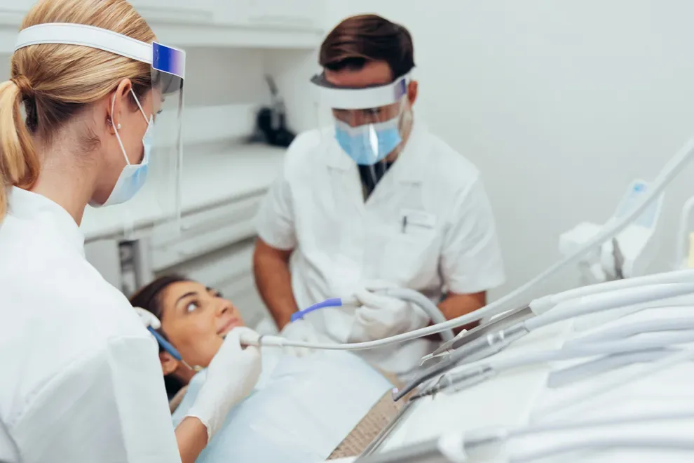 person-getting-teeth-shaving