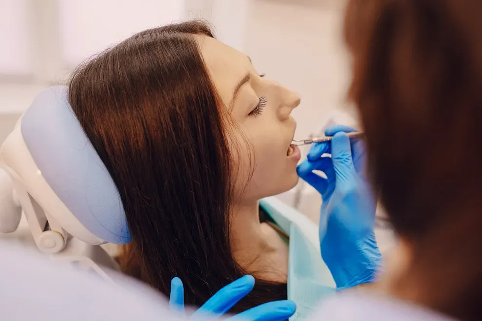 Teen Girl Getting Teeth Checked