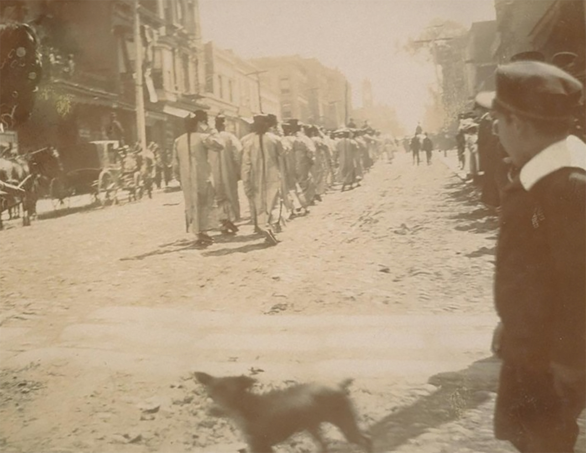 procession in the street sepia tone