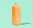 Customized shampoo bottle with orange color formula