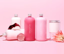 Custom Hair Mask shown with Custom Shampoo, Conditioner and Co-Wash products, in a range of pink colors. 