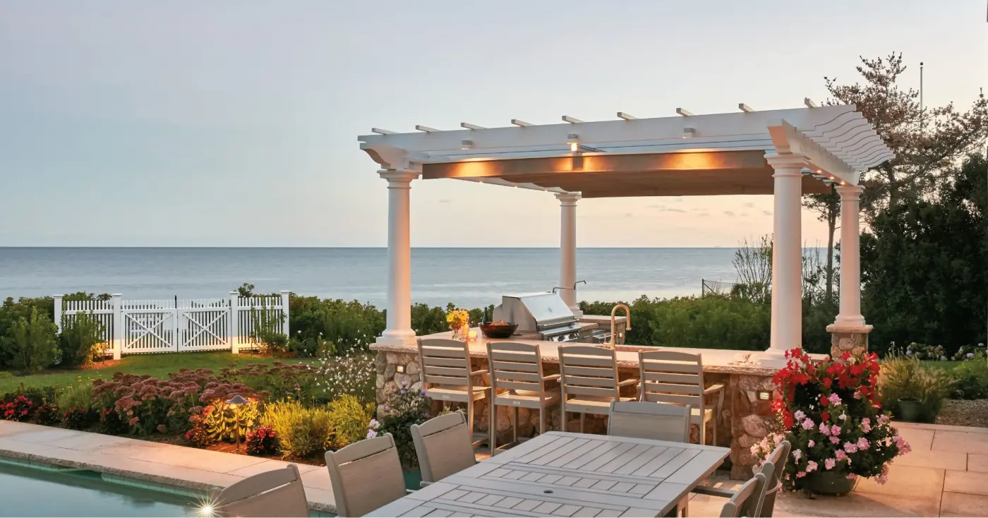 Pergola with outdoor kitchen overlooking ocean