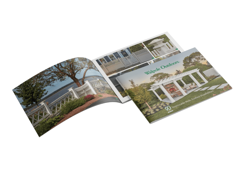 catalog pages on display covered from side to side with pictures of fences and pergolas 