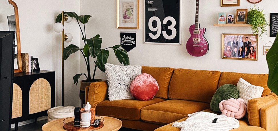 Stacy's living room, featuring a gallery wall. Photo courtesy of Stacy M.