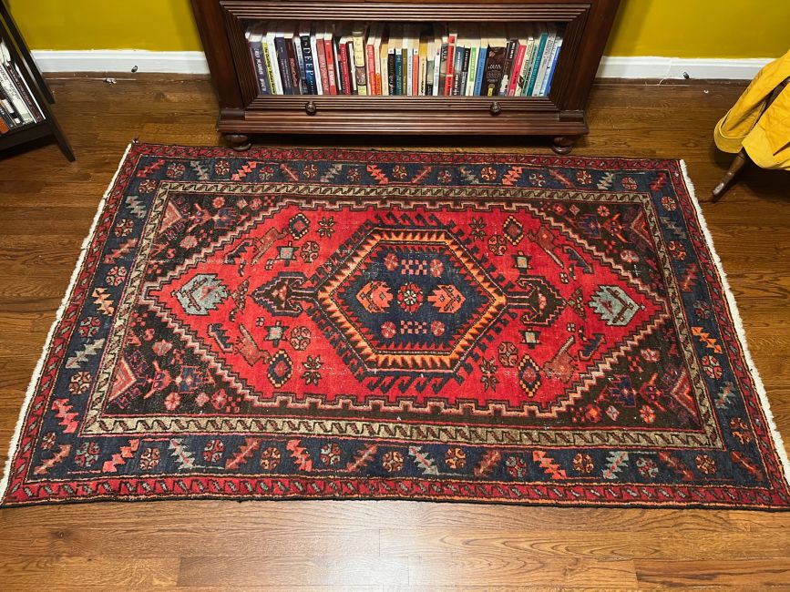 One of writer Mary Kay McBrayer's favorite estate sale finds is a rug that still had the original Iranian tag attached.