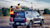 Man with reflective vest on back of car setting up Trimble mobile mapping technology