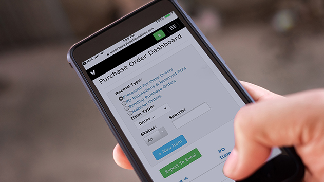 A person holding a smartphone displaying the Trimble Viewpoint Purchase Order Dashboard.