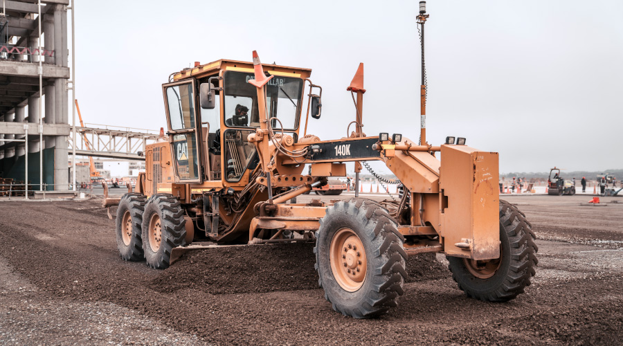 Motor grader at lima airport