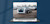 Laptop showing Trimble autonomous technology in car parking lot