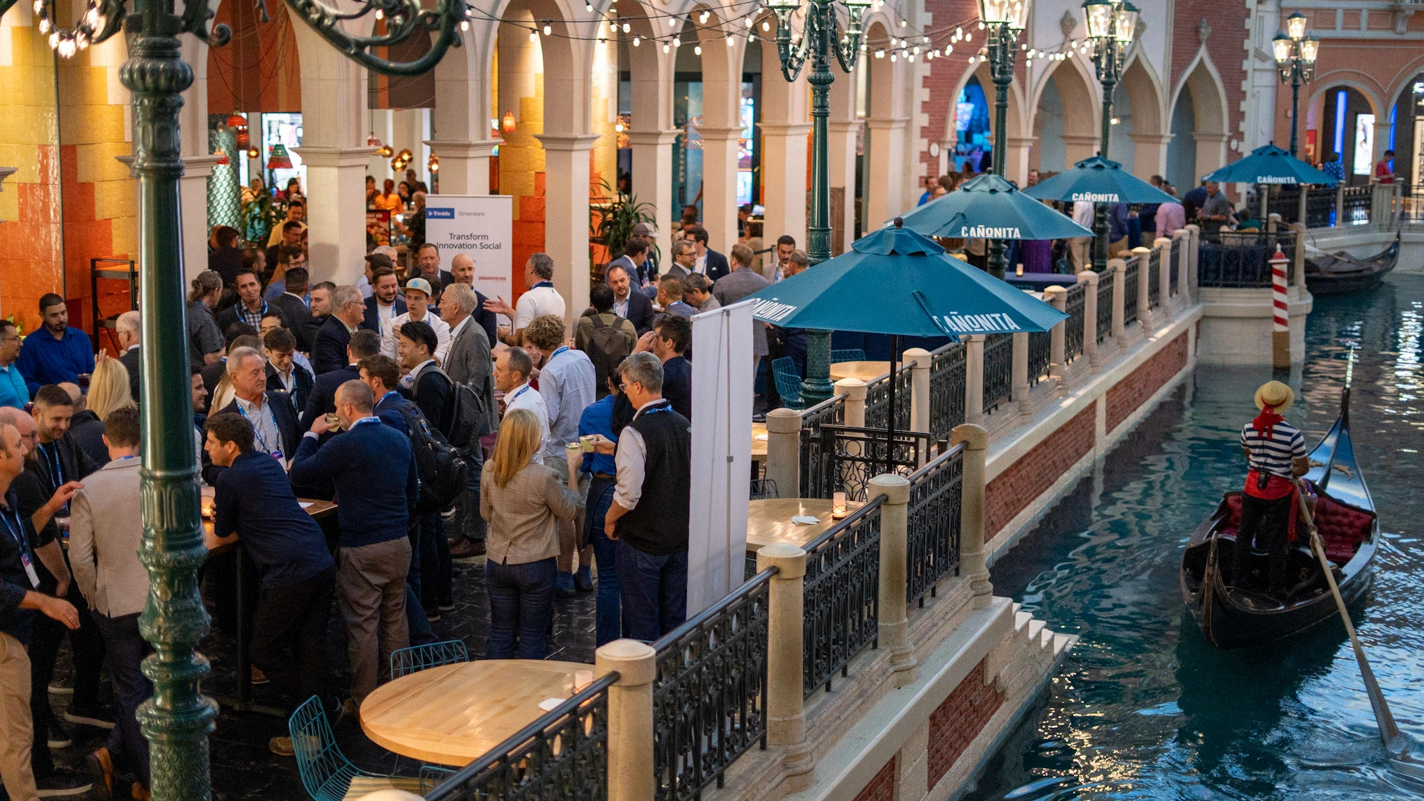 View from above the Transform Innovation Social at Canonita in The Venetian. Trimble Dimensions attendees are networking.