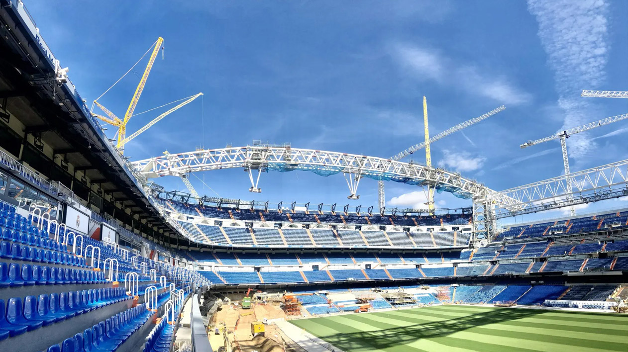 Bernabeu stadium with cranes to construct retractable roof