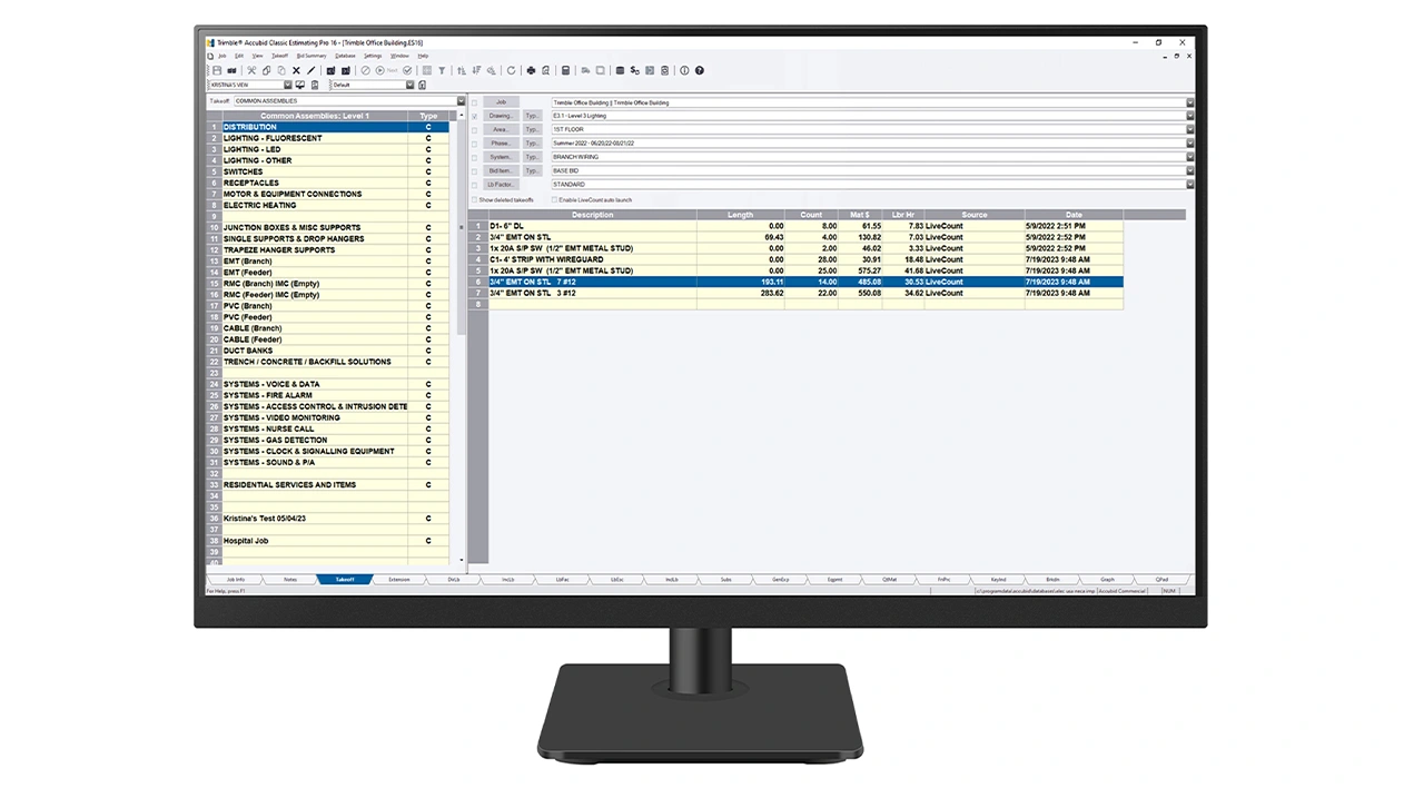 A desktop monitor displays Trimble Accubid Classic software.
