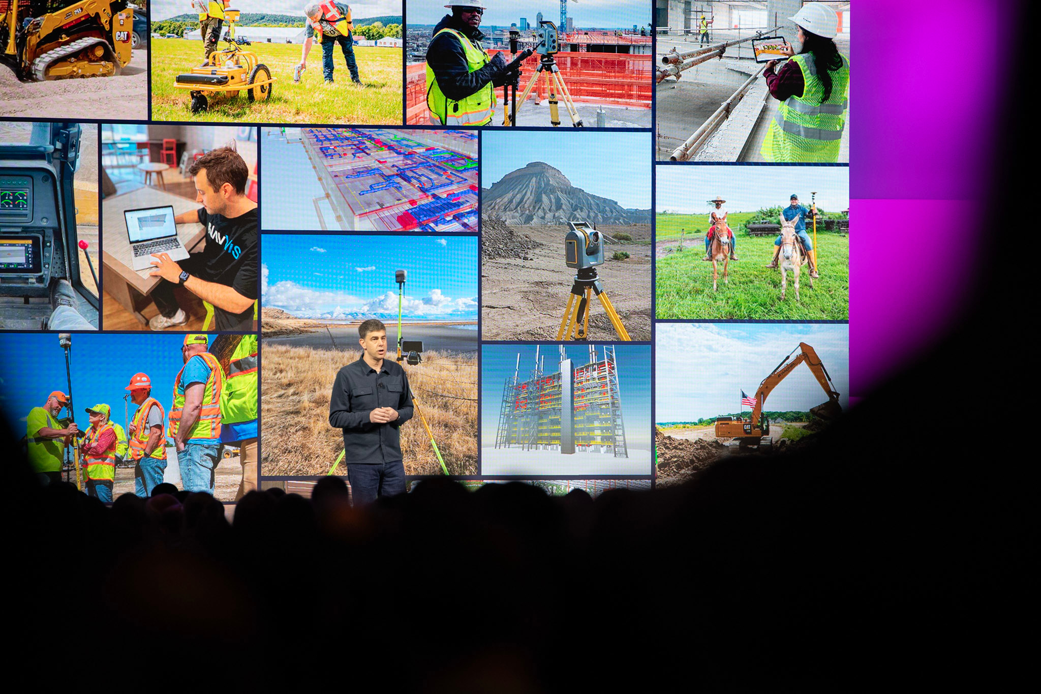 Trimble SVP Mark Schwartz presents at the keynote in front of a screen filled with images of Trimble solutions in the field.