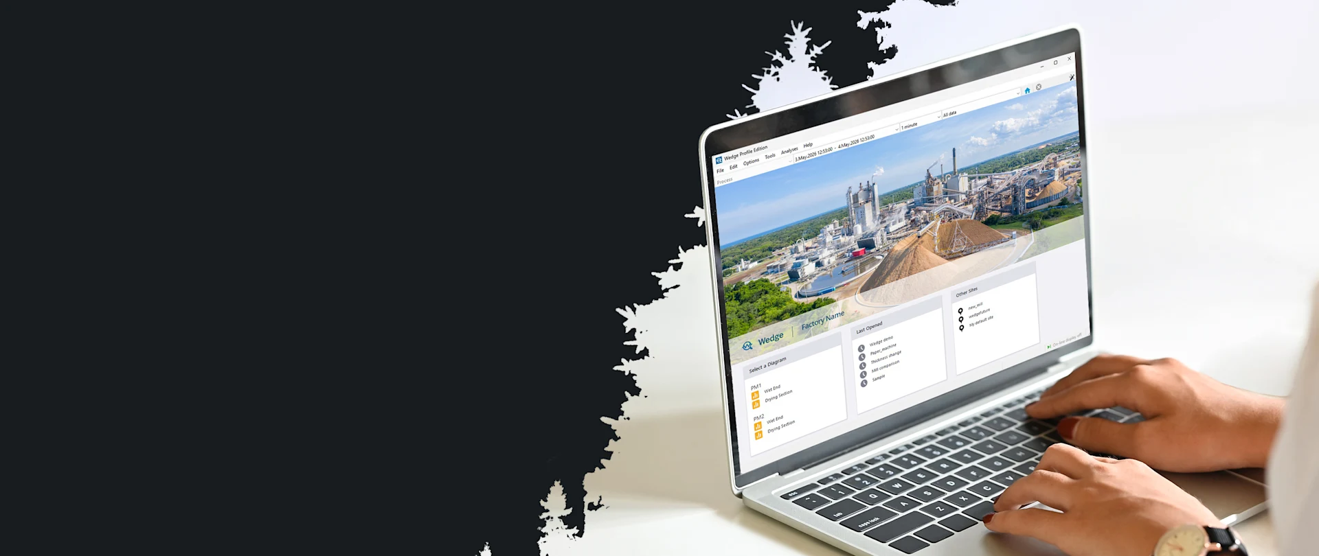 Eine Person in einem weißen Hemd benutzt einen Laptop, auf dem eine farbenfrohe Webseite mit Stadtansichten zu sehen ist. Die Atmosphäre ist hell und minimalistisch.