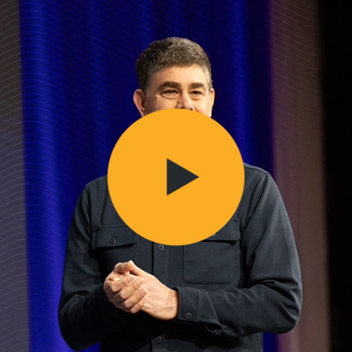 Mark Schwartz, Trimble SVP, introduces Trimble AI at the Dimensions User Conference, showcasing productivity and efficiency in AEC workflows.