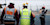 Field workers paving a runway