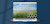 Laptop showing image of cornfield