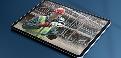 Tablet playing a Beard Construction video about using Viewpoint Field View on-site for project management.