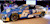 Trimble #6 car parked on a stage indoors with an audience in the background.