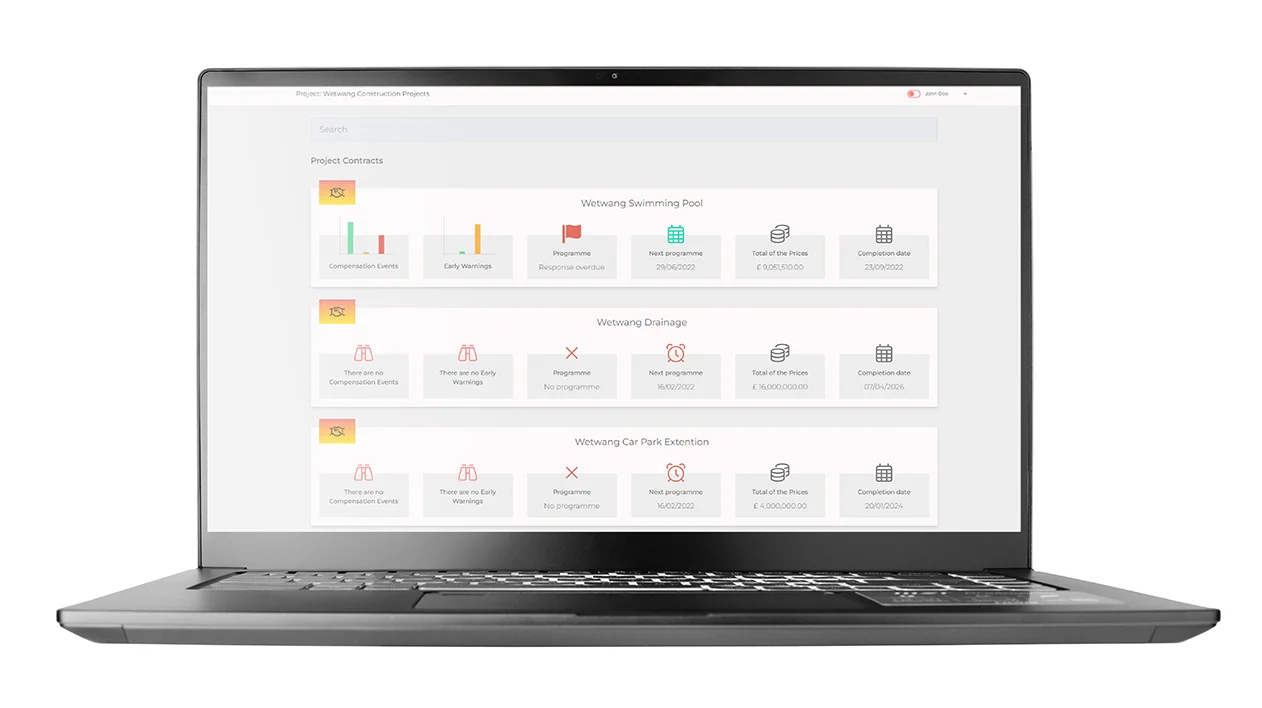 A laptop screen displays a Sypro Contract Manager dashboard, integrated with Trimble Viewpoint, showing construction project management data.
