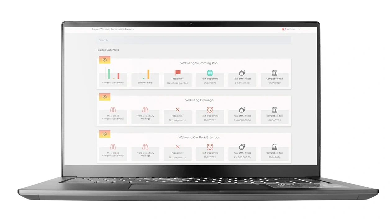 A laptop screen displays a Sypro Contract Manager dashboard, integrated with Trimble Viewpoint, showing construction project management data.