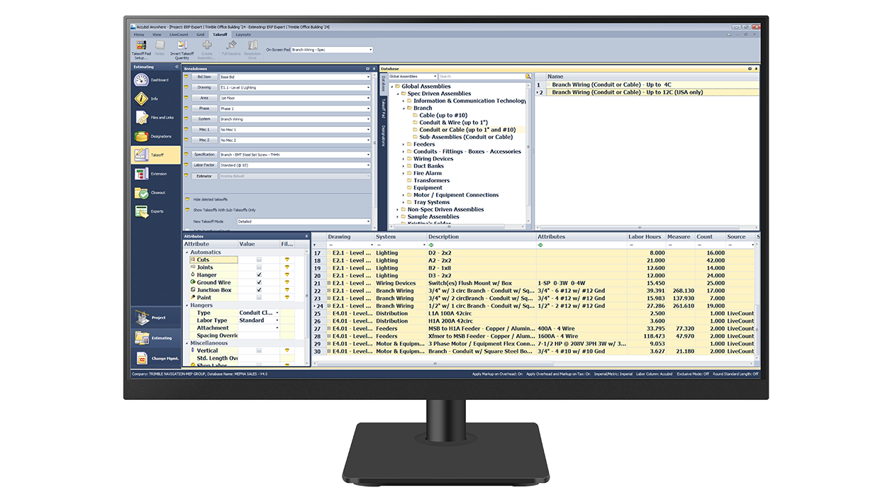 A desktop monitor displays Trimble Accubid Anywhere software.