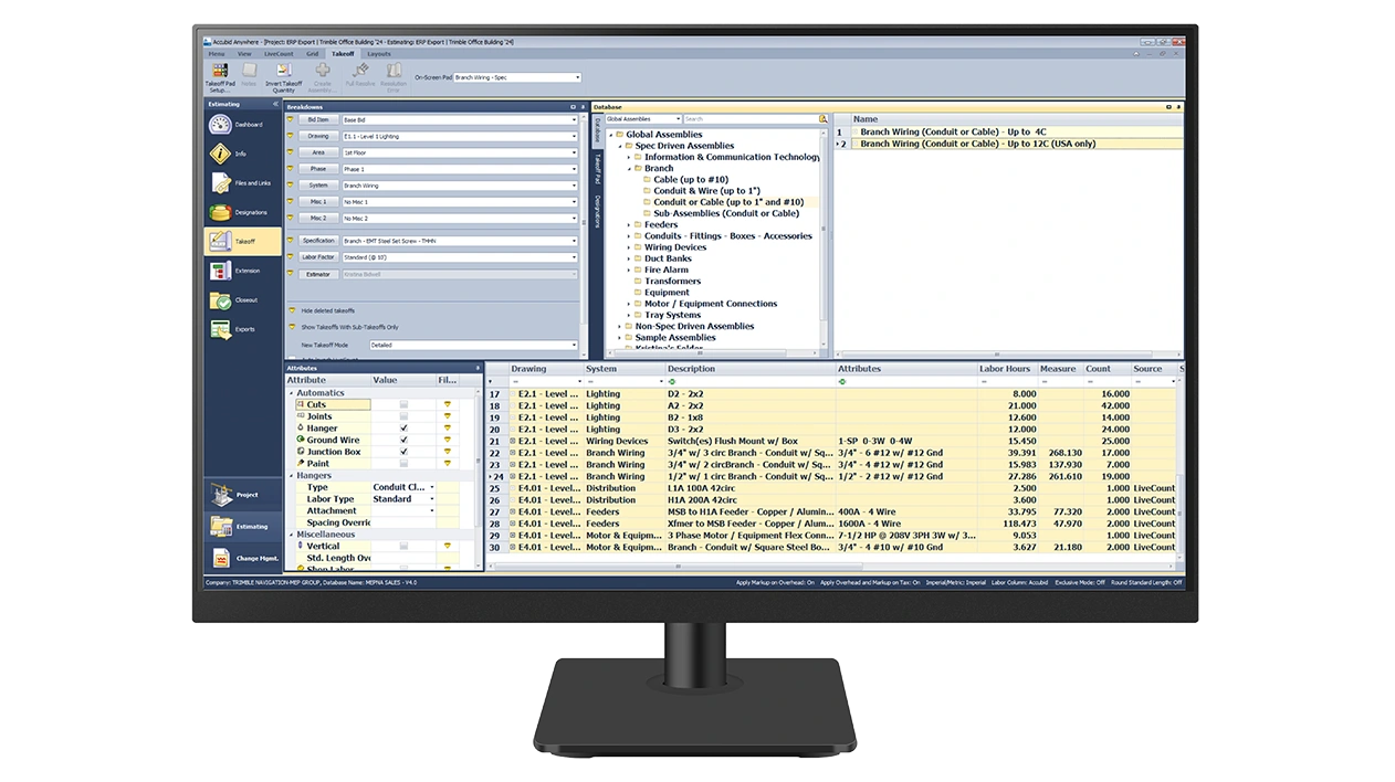 A desktop monitor displays Trimble Accubid Anywhere software.