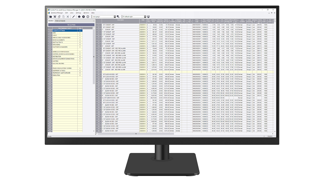 A desktop monitor displays Trimble Time and Material Billing software.
