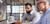 Two men looking at computer screens showing digital buildings