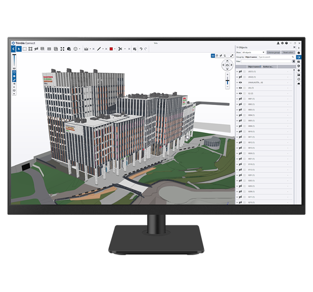 A desktop monitor displays Trimble Connect software