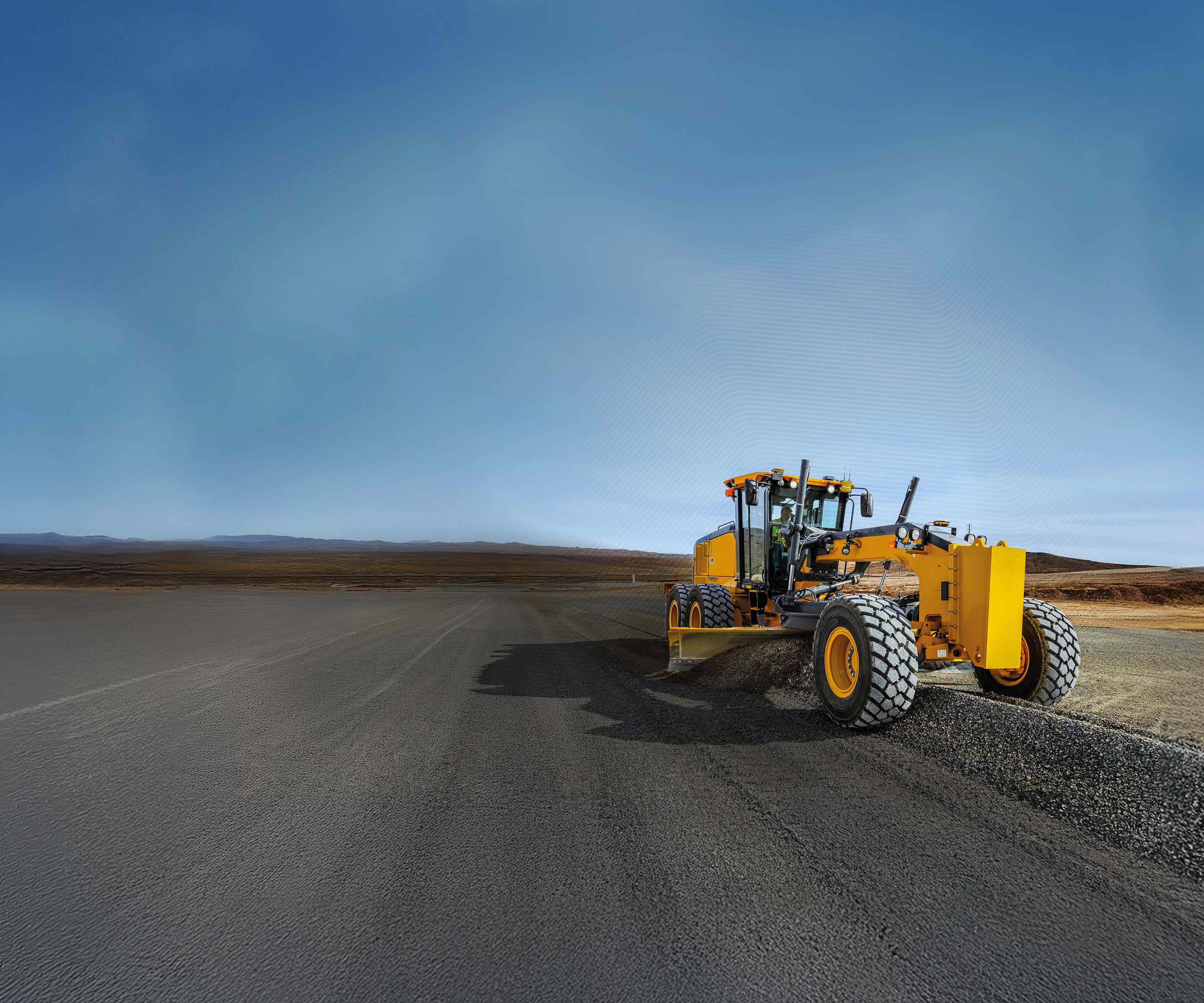 Yellow motor grader leveling a road, featuring a digital grid representing Trimble Earthworks machine control technology.