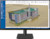 Computer monitor showing a detailed 3D building model and tower crane in the Trimble Tekla Structures BIM software interface.