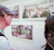 Two people viewing architectural renderings of the "404 FOUND" coworking space at the SketchUp Ascent competition exhibit.