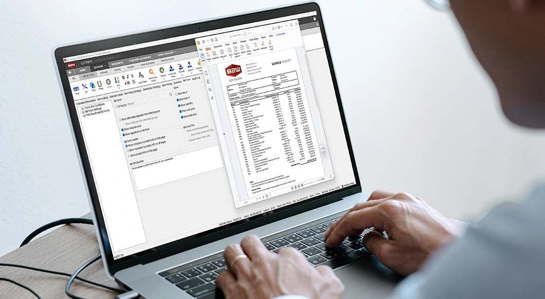 A person uses Trimble’s B2W Estimate software on a laptop to review a sample construction bid report.