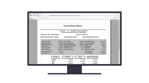 A computer monitor displays a JC Contract Status Report in Trimble Viewpoint Vista construction management software.