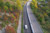Aerial view of Tuscany roadway with trees on either side and mobile mapping system