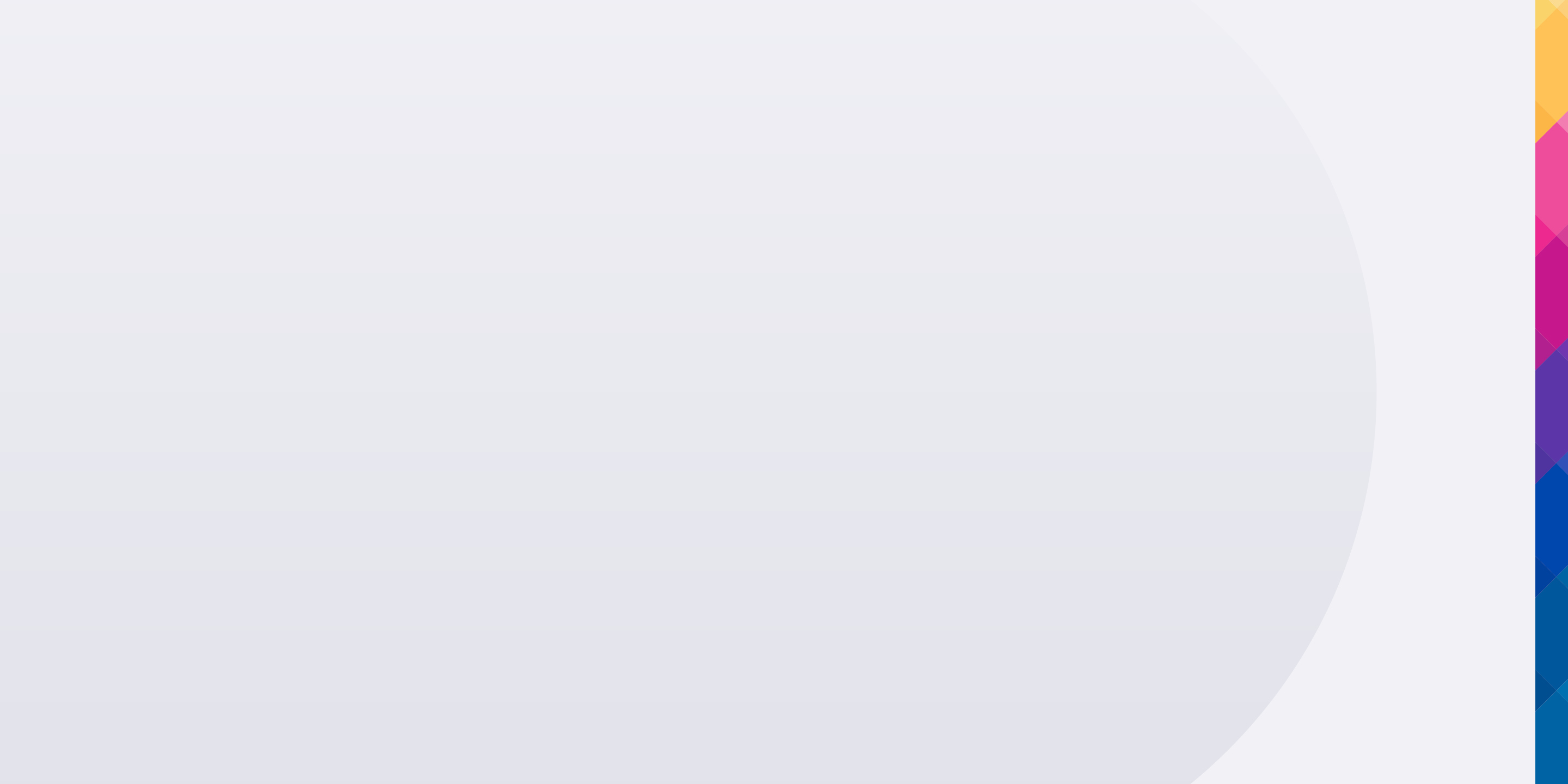 A man in a blue plaid shirt and a woman in a grey sweater share a smile while collaborating in a bright, modern office hallway.