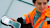 Woman in reflective vest using Trimble TSC3 equipment
