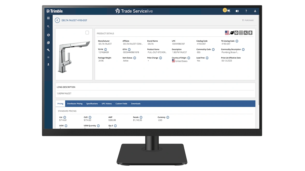 A desktop monitor displays TRA-SER pricing software.