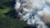 Aerial view of forest fire with smoke