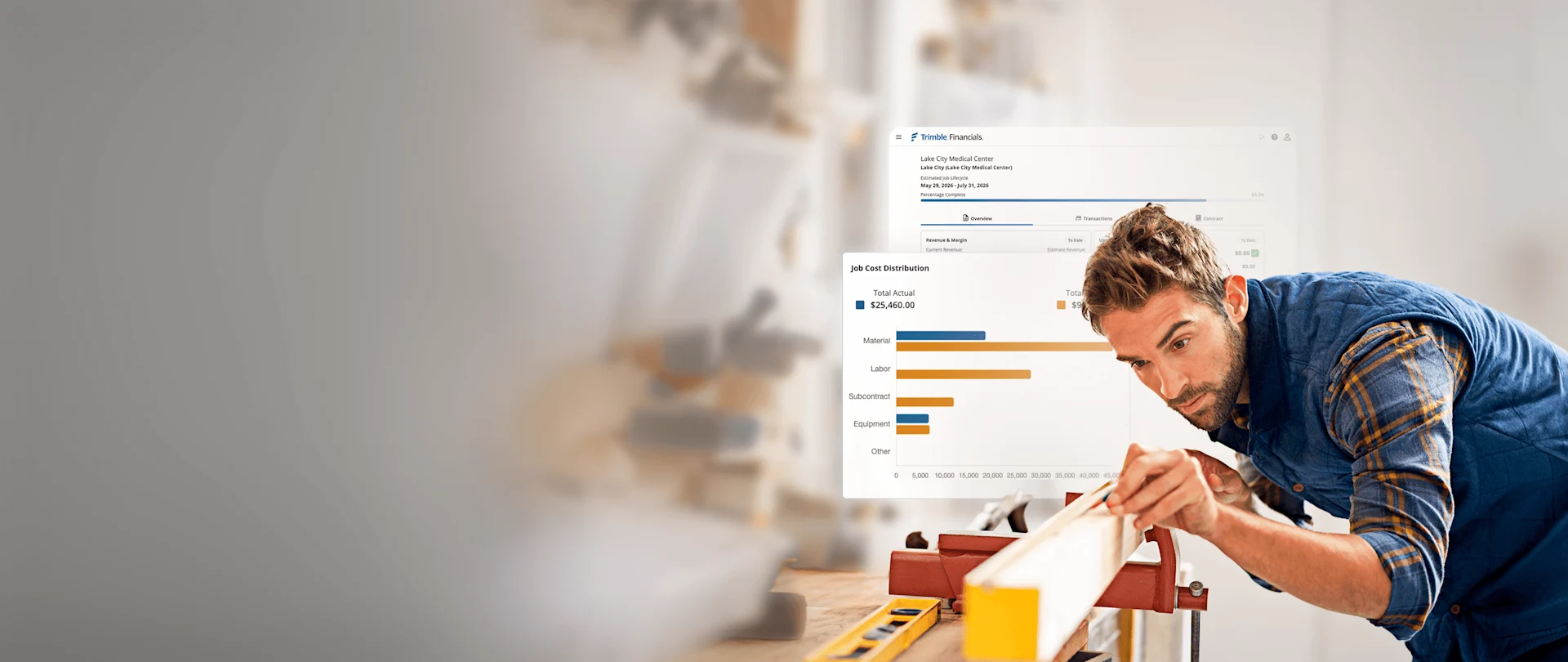 A carpenter works in a woodshop next to a floating software interface displaying construction financial data and a job cost chart.
