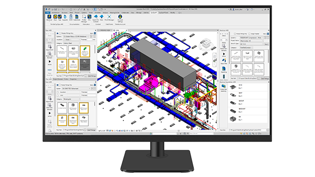 A desktop monitor displays Trimble SysQue software