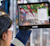 Woman in safety gear using Trimble SiteVision software on tablet in construction site