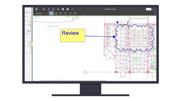 A computer monitor displaying a digital architectural floor plan with a blue cloud markup and a yellow "Review" note.