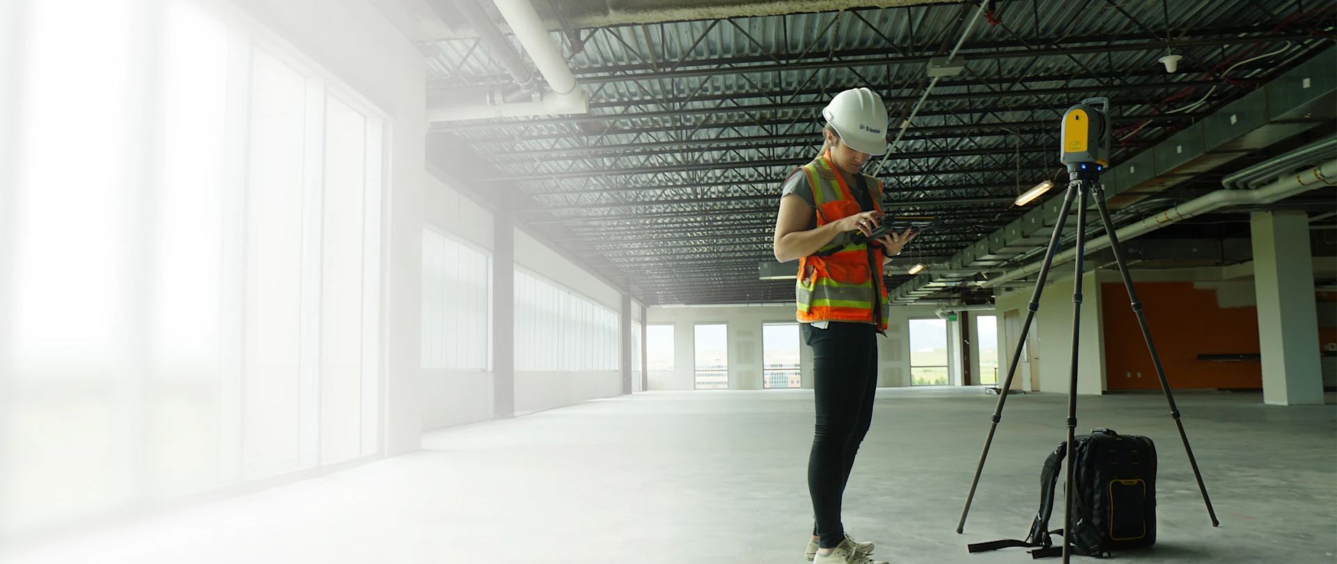 Construction worker with scanning equipment