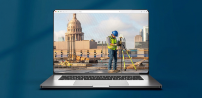 JE Dunn team member verifying a layout point with precision tools during a concrete pour in Austin, Texas.