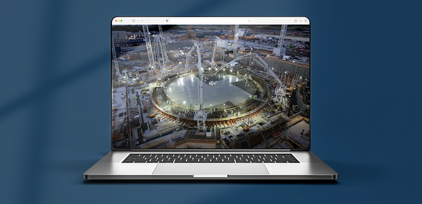 Laptop displaying the Hinkley C nuclear plant under construction, showcasing a Viewpoint Field View case study.