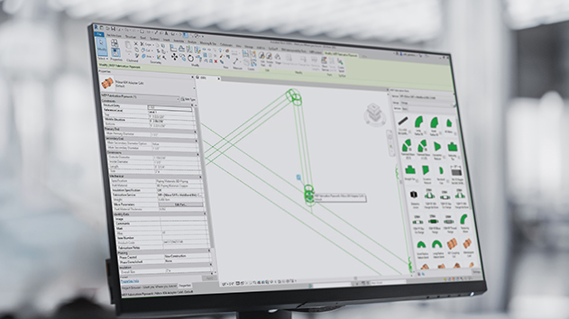 A close-up of a computer monitor showing a 3D model with a library of pipe fittings on the right.