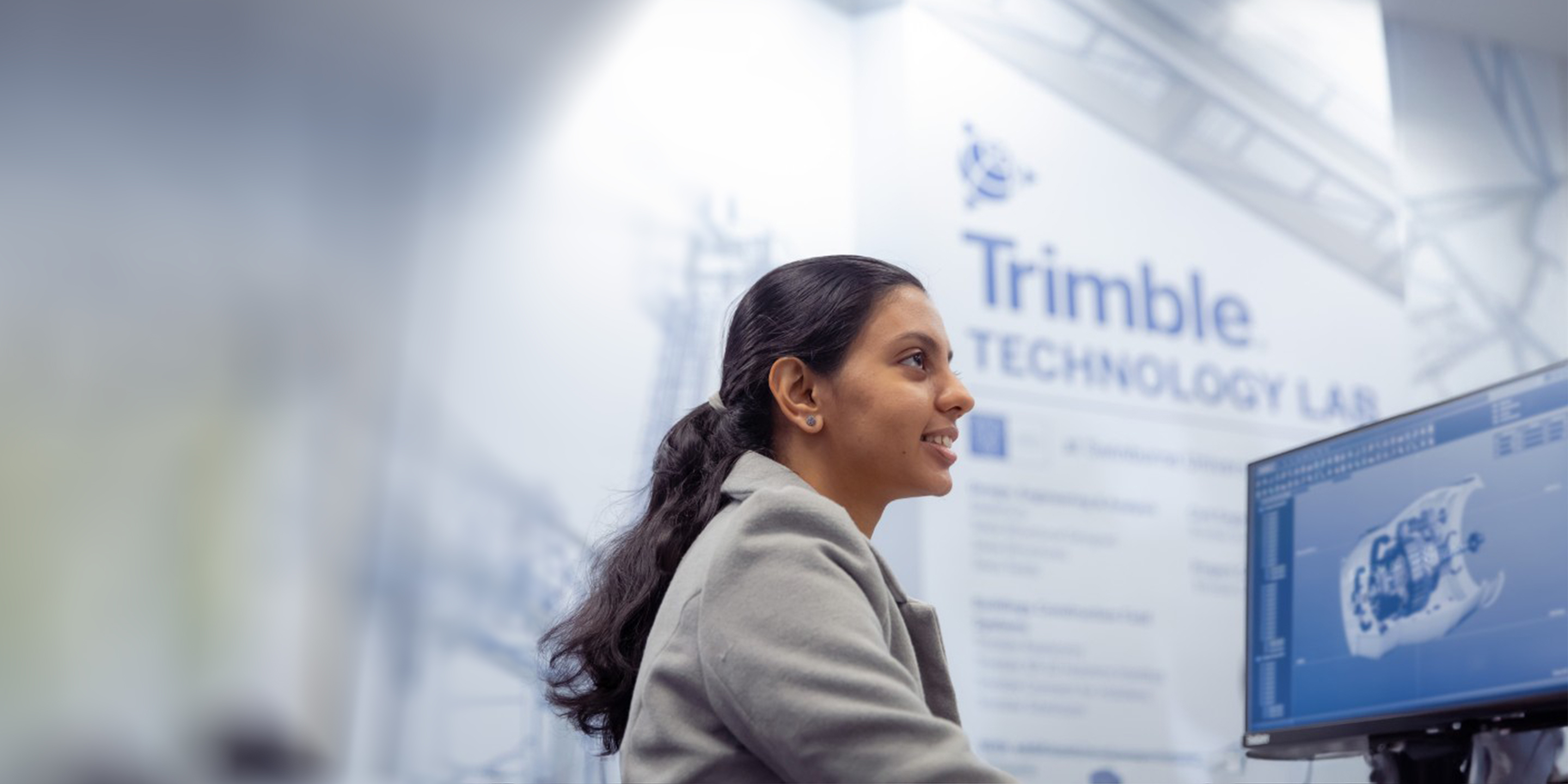 Female student at computer in Trimble Technology Lab